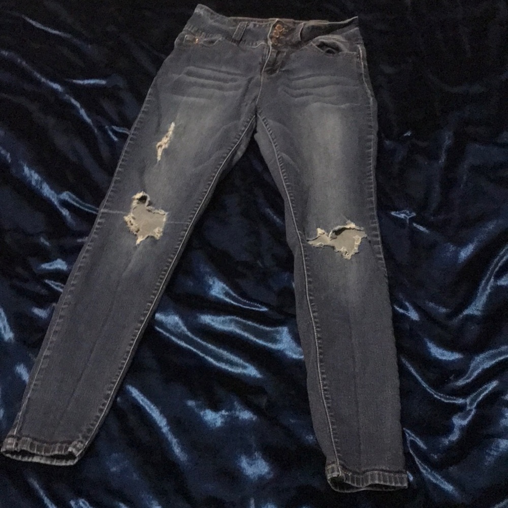 Ripped blue jeans